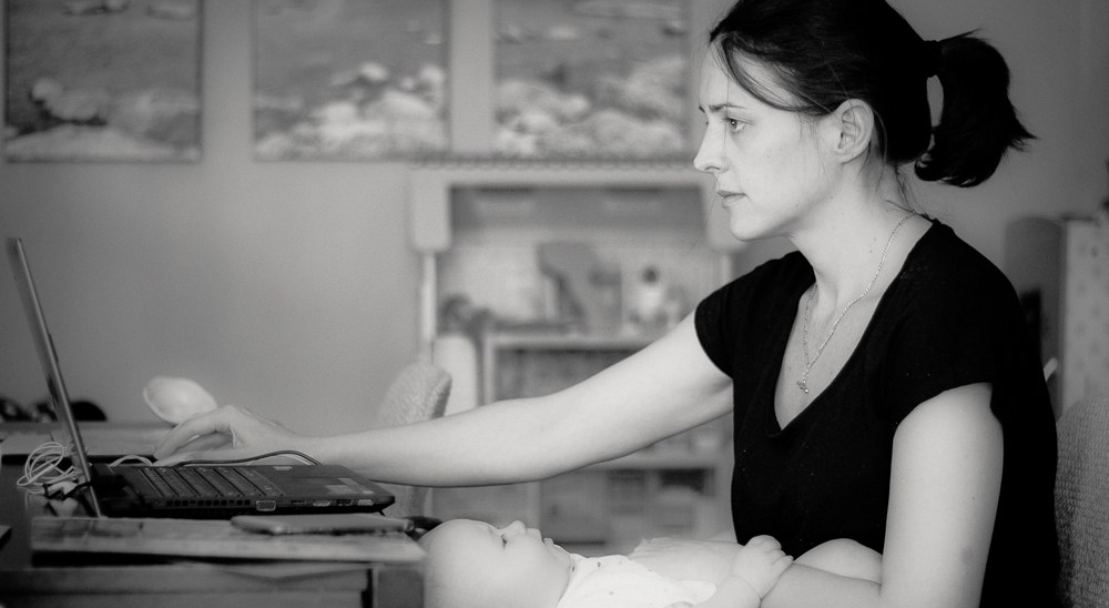 Freelancer Caitlin and baby working
