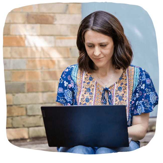 Caitlin Wright on the computer